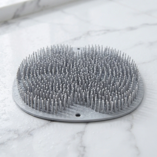 Tapis de douche exfoliant Ondaly, picots souples et trous d'évacuation